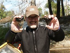 Diving & Digging for Fossils - Tom Lichauco was real happy with his two Megalodon teeth!