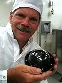 NASA - JSC Visit - Greg holding Apollo 11 moon rock sample.