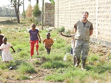 Thika, Kenya Expedition - Greg hunting with a few eager local kids who wanted to help.