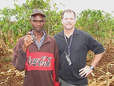 Thika, Kenya Expedition - Greg with local farmer who found a nice meteorite.