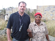 Thika, Kenya Expedition - Greg with local woman who found a nice little stone.