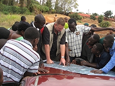 Thika, Kenya Expedition - Mike showing the strewnfield map to lcoals.