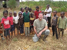 Thika, Kenya Expedition - Greg with an enthusiastic group of young hunters.