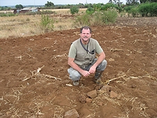 Thika, Kenya Expedition - Greg on site of first recovered meteorite from the fall.