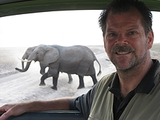 Thika, Kenya Expedition - Greg with passing elephants while on Safari.
