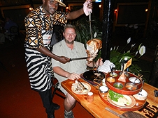 Thika, Kenya Expedition - Carnivore Restaurant - Mike asks for just a slice.