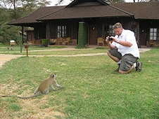 Thika, Kenya Expedition - Mike taking photos of a curious monkey.