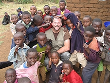 Thika, Kenya Expedition - The infectious laughter of these kids has Greg at all smiles!