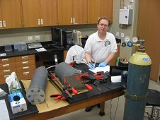 UCF Laboratory - Bob Macke preparing to measure NWA 7030 ungrouped meteorite. July 2011