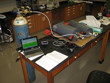 UCF Laboratory - Workstation in UCF laboratory for measuring density of meteorite.