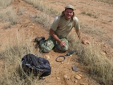 Whetstone Mountains Expedition - Greg with 80.9 gram meteorite as found.